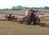 Two International tractors ploughing 